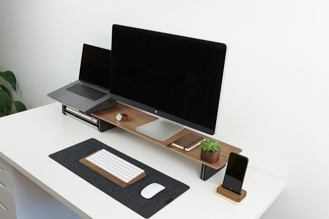 An Ash Monitor and Laptop Riser With a Keyboard Cubby